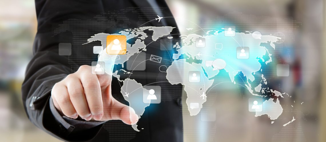 Social Network concept : Business man  point to social network and world map